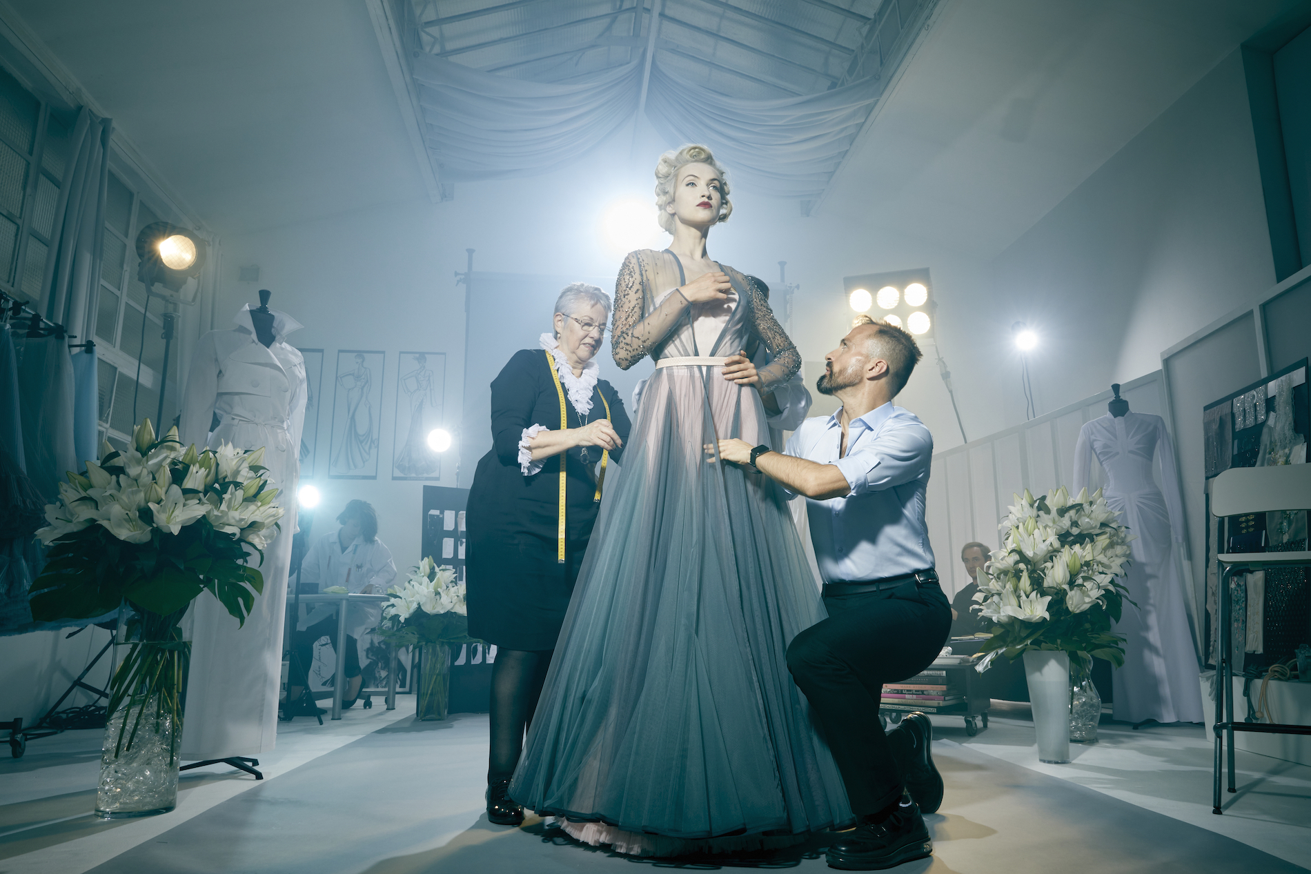 Haute couture fitting in a Parisian atelier